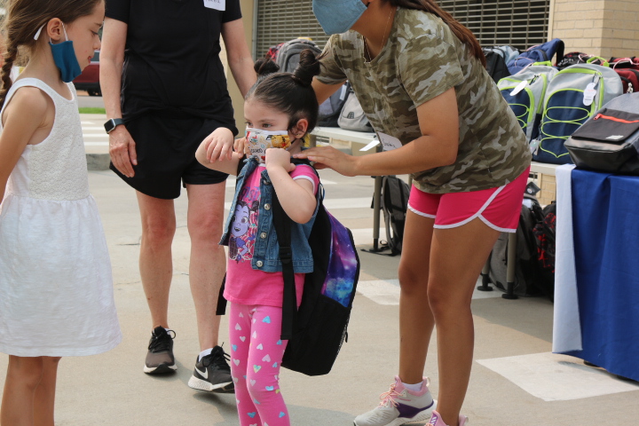 600 elementary and high school students in Metro Denver received new backpacks and supplies