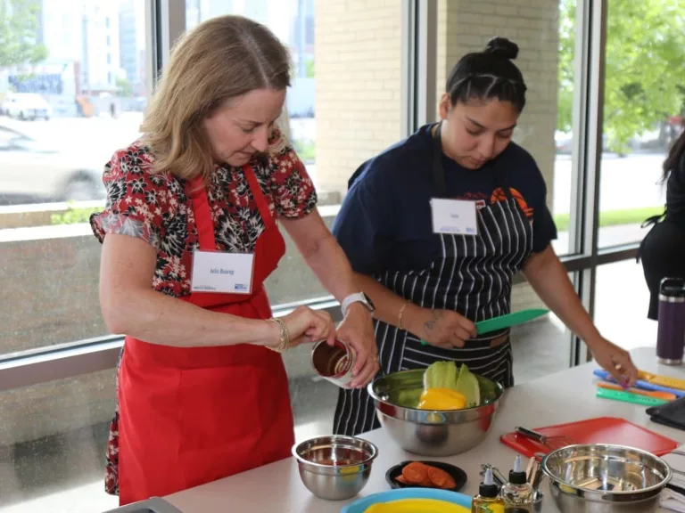 Women of Tocqueville volunteers joined a cooking class for our BTG participants