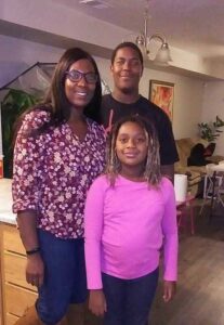 Felicia Bolton, pictured with her two children, is a volunteer with our PIE program as a member of the advisory council